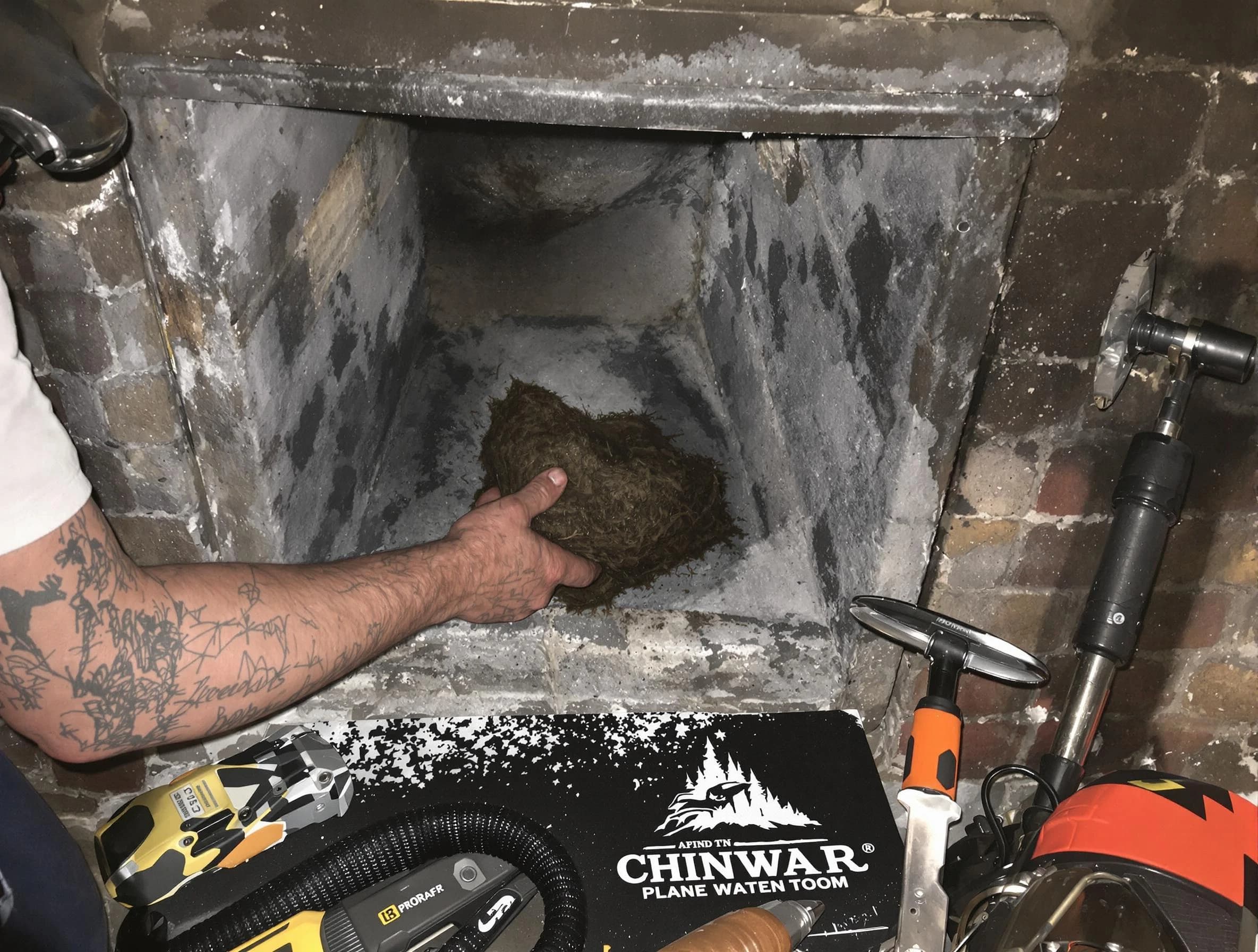 Riverdale Chimney Sweep safely removing debris and screening chimney in Riverdale, UT