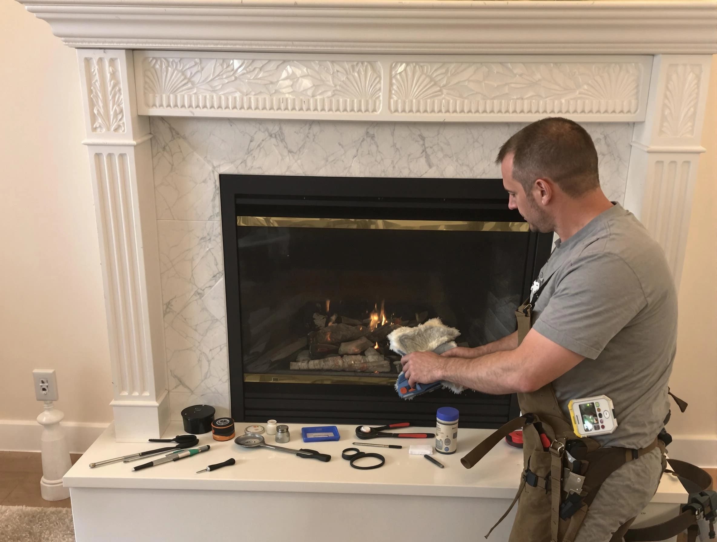 Riverdale Chimney Sweep performing fireplace maintenance in Riverdale, UT